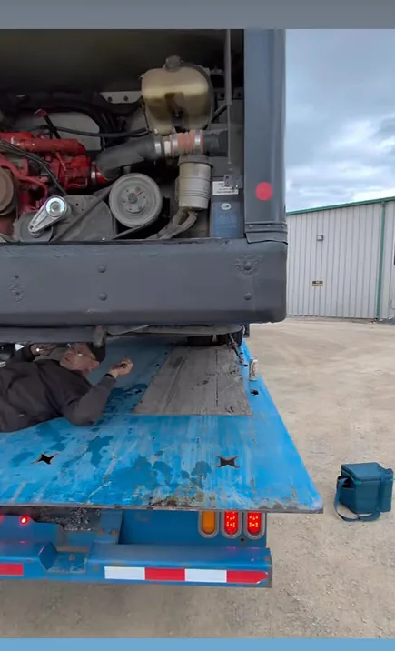 Open bus engine compartment on a bus
